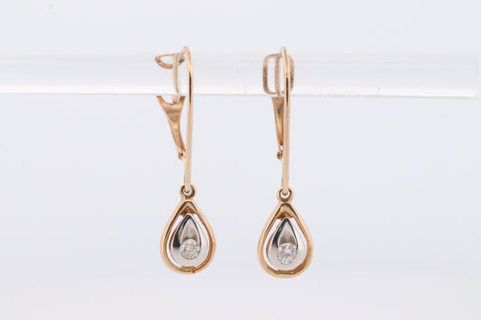 10k Diamond Dangle Earrings. Diamond Drop Teardrop Diamond Dangle earrings. Yellow and White Gold bezel set diamond.