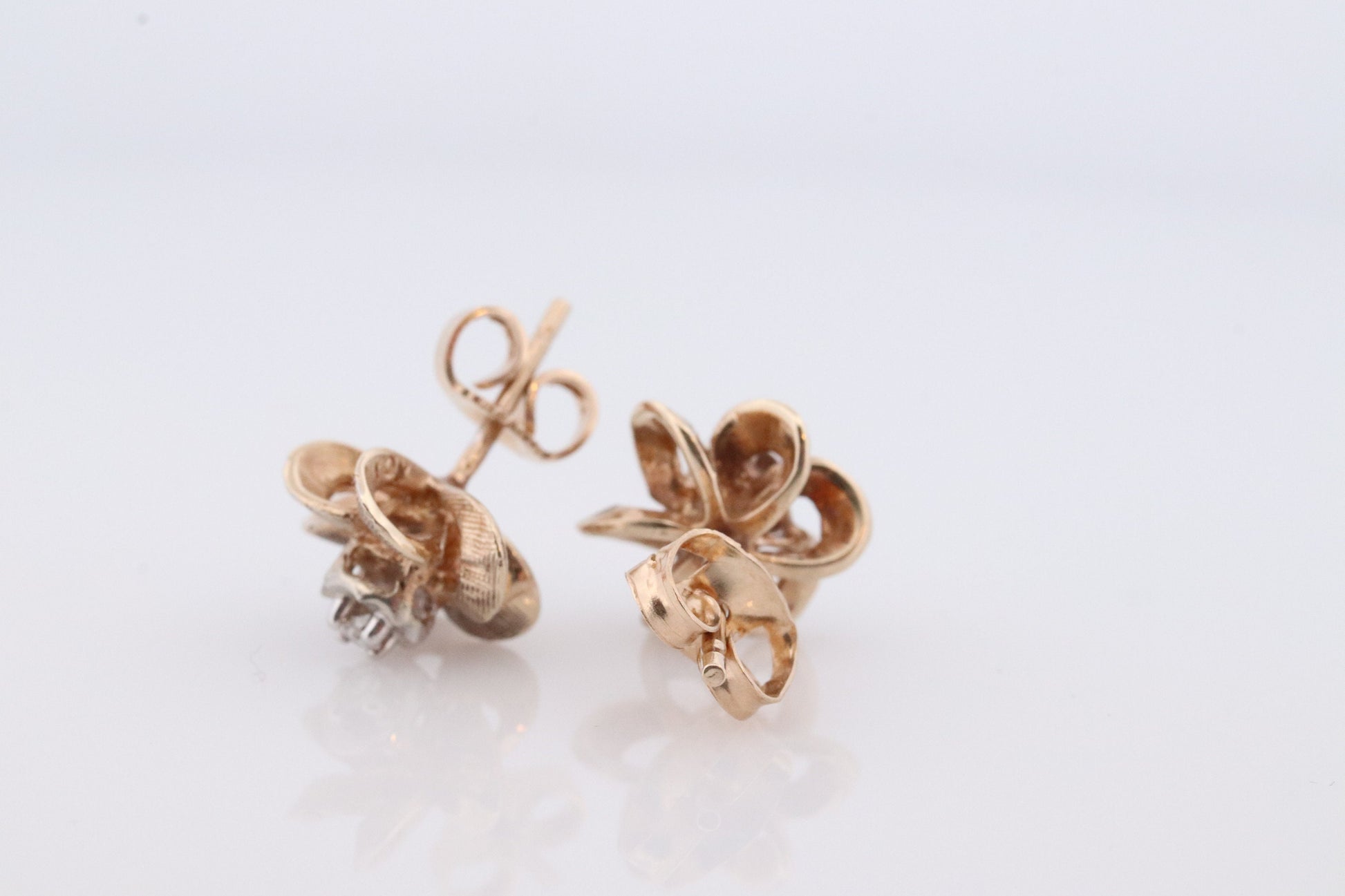 10k Diamond Flower or Star stud earrings. Flower Diamond Solitaire earrings. Propeller Flower Studs.