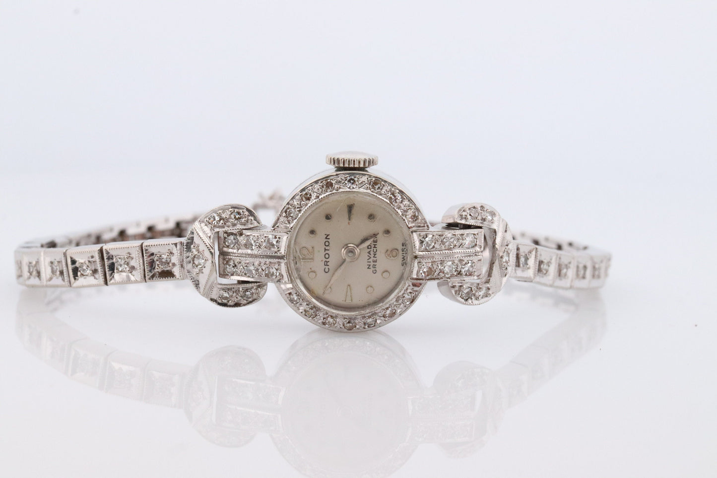 14k CROTON Nivada Grenchen LADIES wrist watch. 14k Manual watch with diamonds.