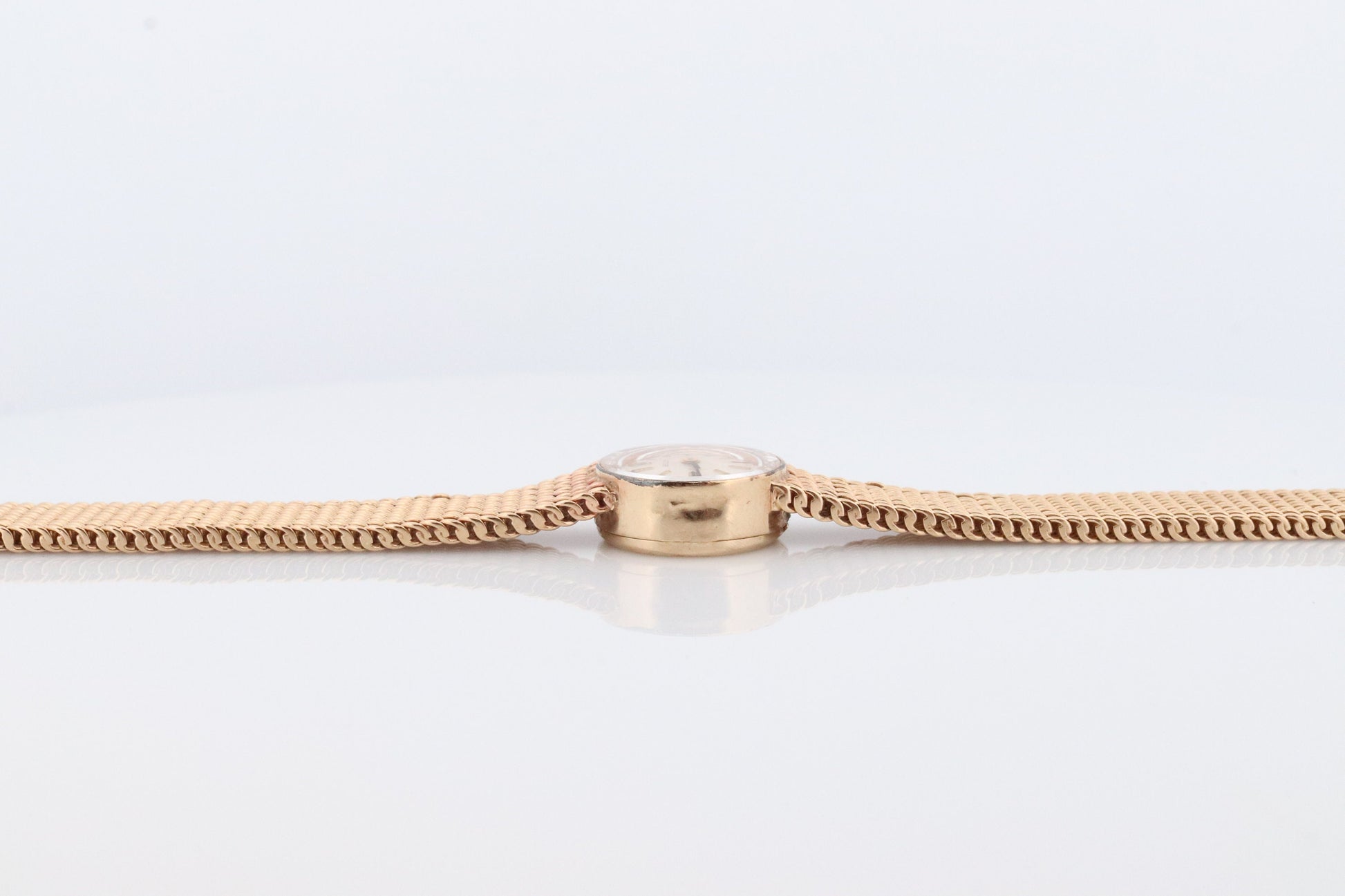 14k Rolex Women's Cocktail Watch. 14k Orchid Rolex with Yellows Gold Bracelet. 1400 Ladies Rolex Watch. Full Gold Rolex round wristwatch.