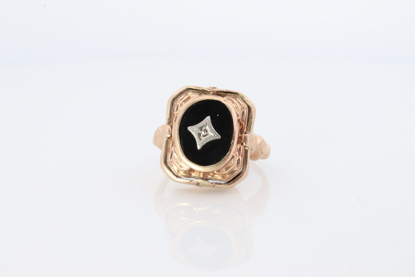 10k Onyx and Cameo Reversible Ring. Victorian Locket / Reverso Ring. 10k Yellow Gold Reverso signet ring.