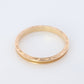 14k Engraved Band. 14k Yellow Gold Train Tracks and Floral Detailed engraving on the side. Fine Hand Engraved pattern ring. JAC