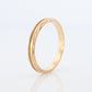 14k Engraved Band. 14k Yellow Gold Train Tracks and Floral Detailed engraving on the side. Fine Hand Engraved pattern ring. JAC
