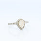14k Moonstone Diamond Halo ring. Pear Rainbow Moonstone set with Diamonds. Diamond Halo Alternate Engagement ring.