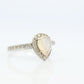 14k Moonstone Diamond Halo ring. Pear Rainbow Moonstone set with Diamonds. Diamond Halo Alternate Engagement ring.