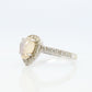 14k Moonstone Diamond Halo ring. Pear Rainbow Moonstone set with Diamonds. Diamond Halo Alternate Engagement ring.