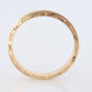14k Engraved Band. 14k Yellow Gold Train Tracks and Floral Detailed engraving on the side. Fine Hand Engraved pattern ring. JAC