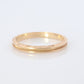 14k Engraved Band. 14k Yellow Gold Train Tracks and Floral Detailed engraving on the side. Fine Hand Engraved pattern ring. JAC