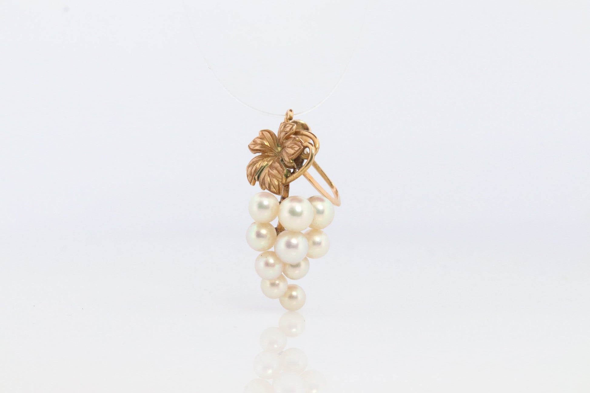 14k MIKIMOTO earrings. Vintage Mikimoto Akoya pearl screw back earrings. Grape vine bunch leaf unpierced clip earrings.