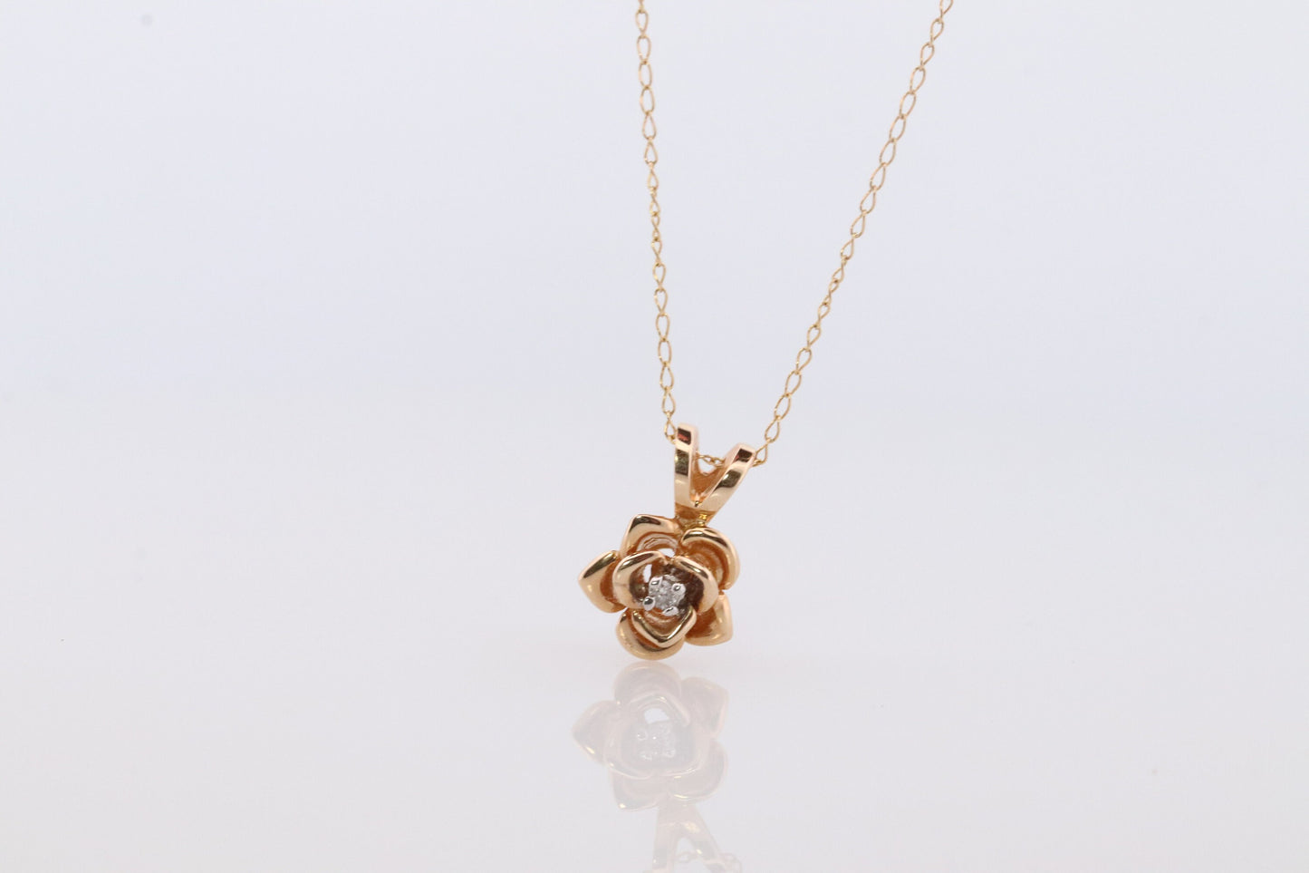 14k Diamond Rose Flower Pendant. 14k Diamond Daisy Rose flower pendant and necklace. Dainty diamond solitaire pendant