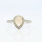14k Moonstone Diamond Halo ring. Pear Rainbow Moonstone set with Diamonds. Diamond Halo Alternate Engagement ring.