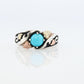 Black Hills Gold Turquoise ring. Sterling Silver and 12k/10k Gold Leaf inlays. Robin Egg color Turquoise cabochon solitaire.