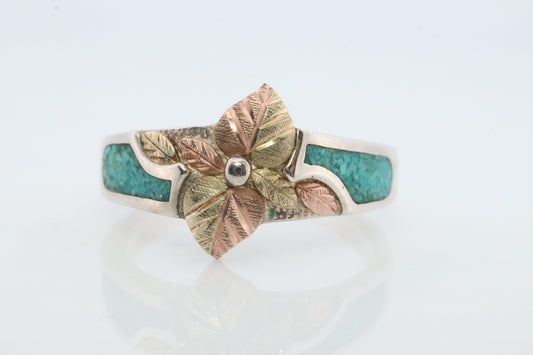 Black Hills Gold Turquoise Ring. Sterling Silver and 10k/12k Gold Leaves. Crushed Turquoise inlay.