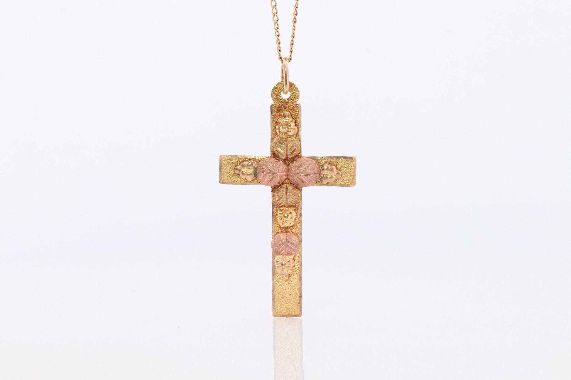 Black Hills Gold Cross Necklace. 10k multi tone Black Hills Gold Crucifix Pendant