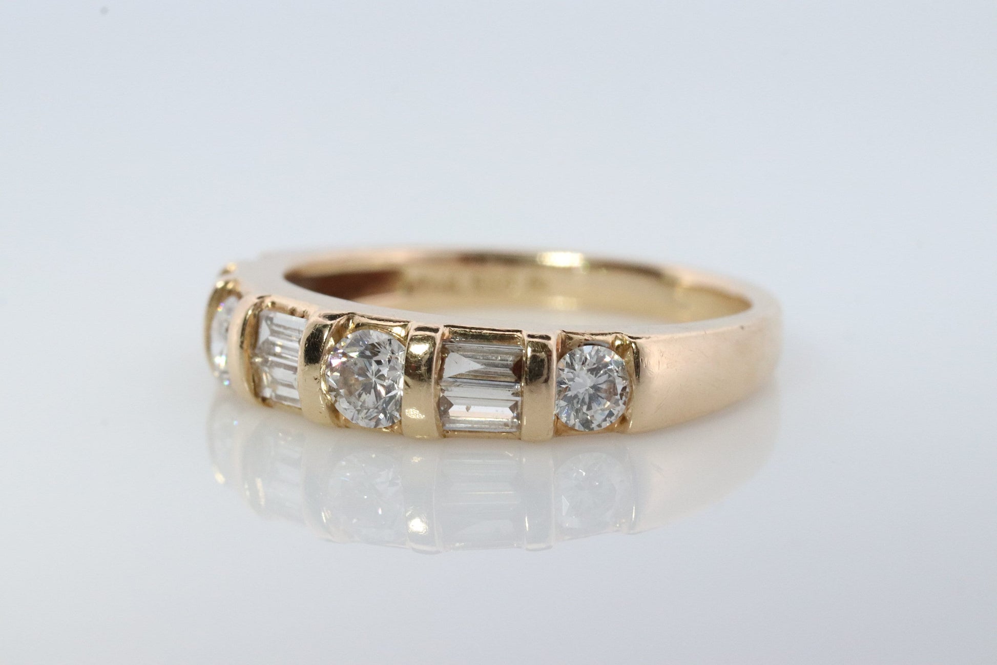 Diamond Band. 14k Yellow Gold with round and Baguette diamonds channel set cluster. 1ctw
