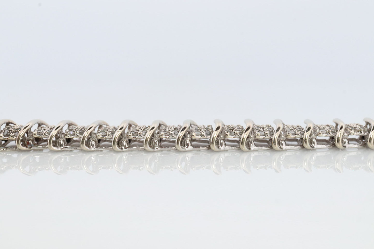 10k Diamond Tennis Bracelet. 10k S-LINK round diamond cluster Tennis bracelet. 2CTW JAFA wide tennis bracelet.