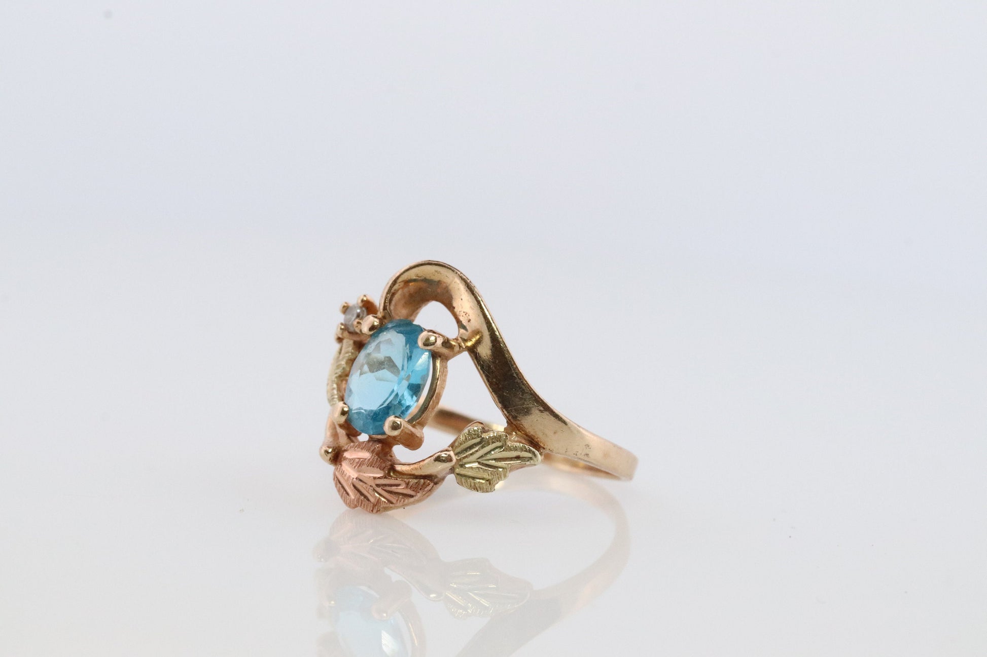 Black Hills Gold Ring. 10k Multi-Tone Blue Topaz and Diamond Black Hills Gold Statement Ring.