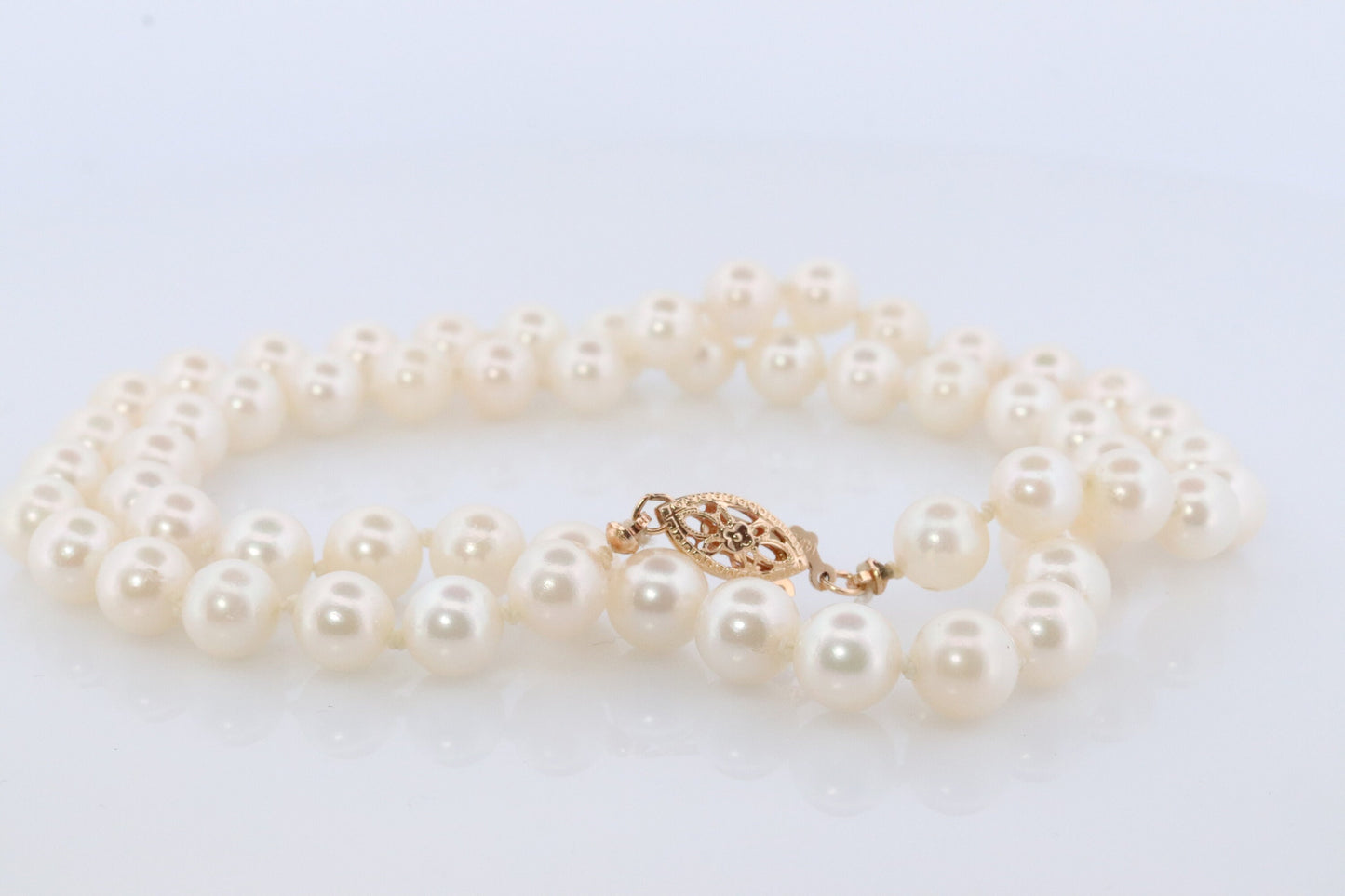 14k Akoya Pearl Necklace. 18in length 7mm AKOYA pearls with beautiful lustre.