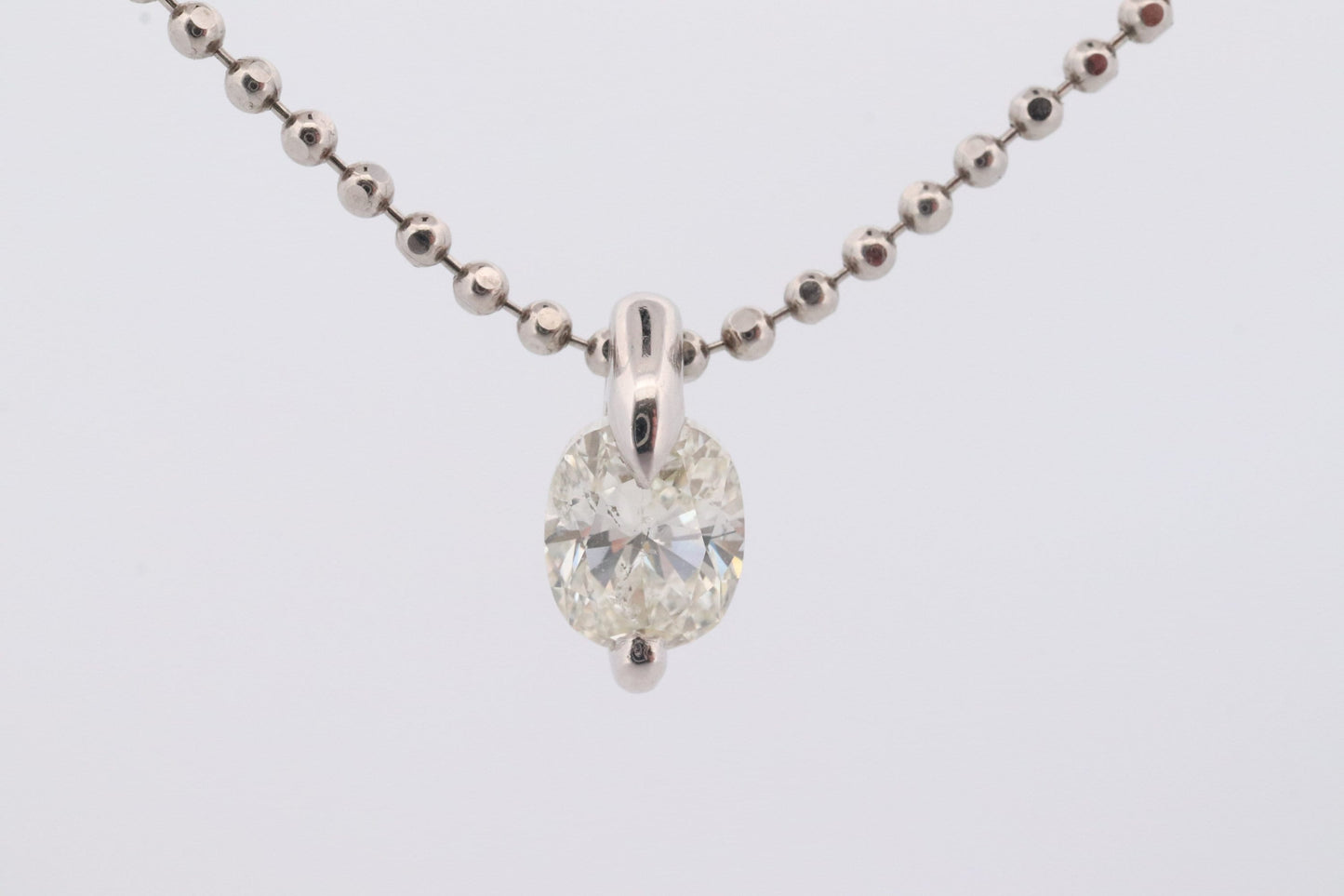 Large Diamond solitaire pendant. Platinum 850/900 Oval diamond 1CT Solitaire Pendant and Necklace. Tension set diamond