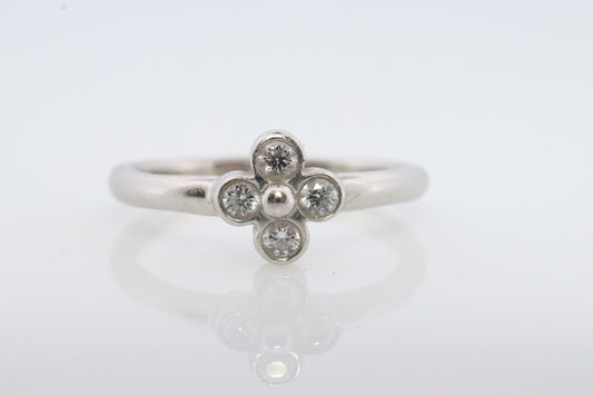 Vintage Tiffany and Co. Diamond Ring. Authentic Tiffany Platinum Diamond wave Band. T&CO Clover Flower Diamond ring.