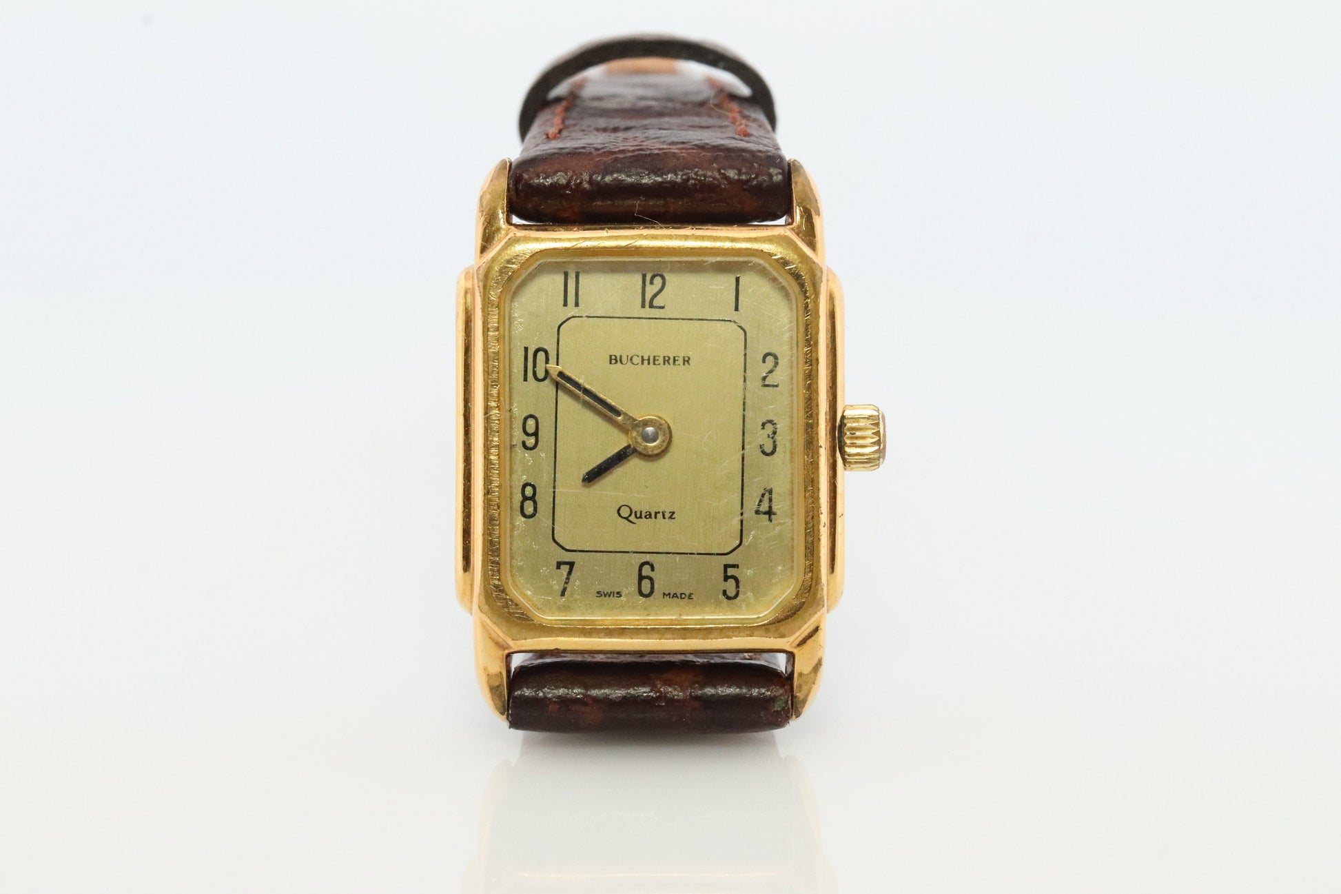 Bucherer Quartz wristwatch. Gold-tone bezel SWISS battery watch. Minimalist design. Serviced. Model 40171 Dp