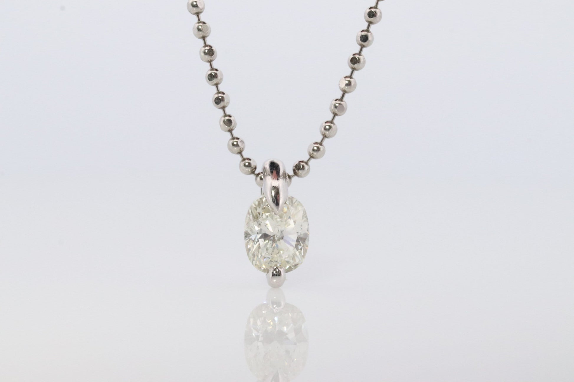 Large Diamond solitaire pendant. Platinum 850/900 Oval diamond 1CT Solitaire Pendant and Necklace. Tension set diamond